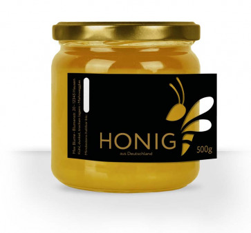 Etikett mit Ausschnitt und Golddruck auf gold-schwarzem Honigetikett