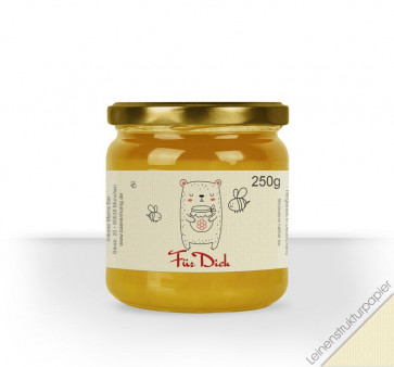 Kleines Etikett "Honigbär" auf Leinenstrukturpapier