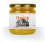 Etikett "Bienenhaus" in Orange auf Honigglas